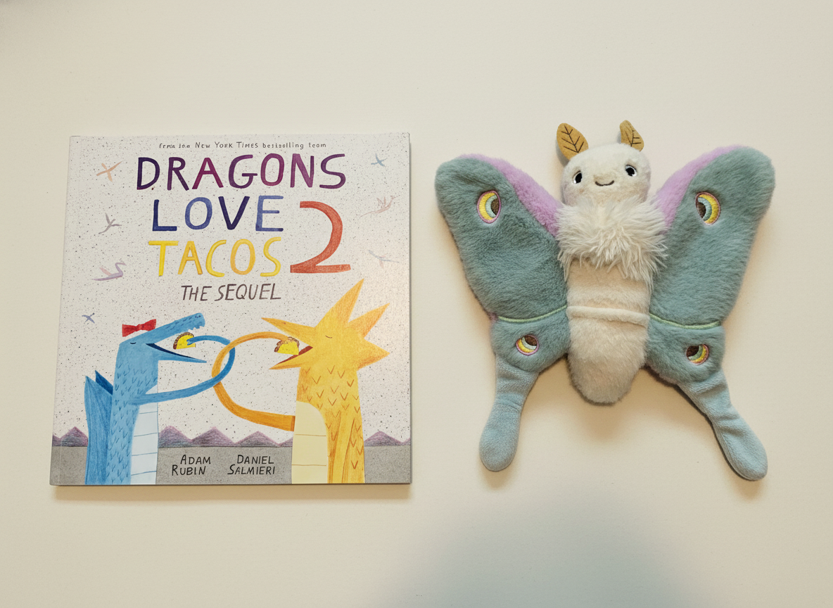 Dragons Love Tacos 2 next to Reference Moth, our resident size guide